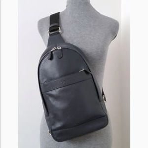 Unisex coach sling backpack